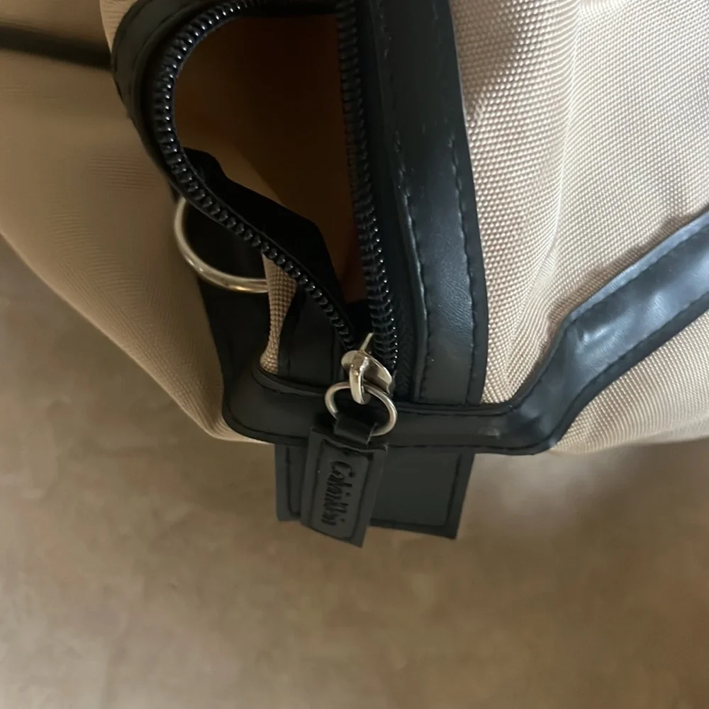 Calvin Klein roller luggage perfect for a carry-on use have some stain